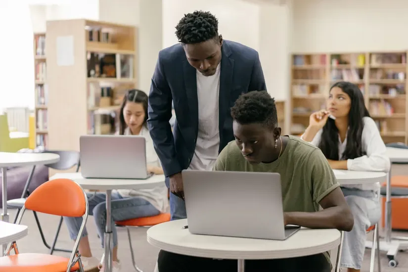 Indian educator building an AI teaching agent on a laptop